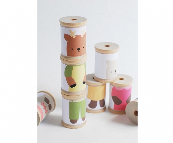 Use this free printable to turn your empty spools into cute mix and match toys