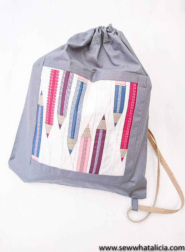 Tutorial and pattern: Drawstring backpack with a paper pieced pencil design